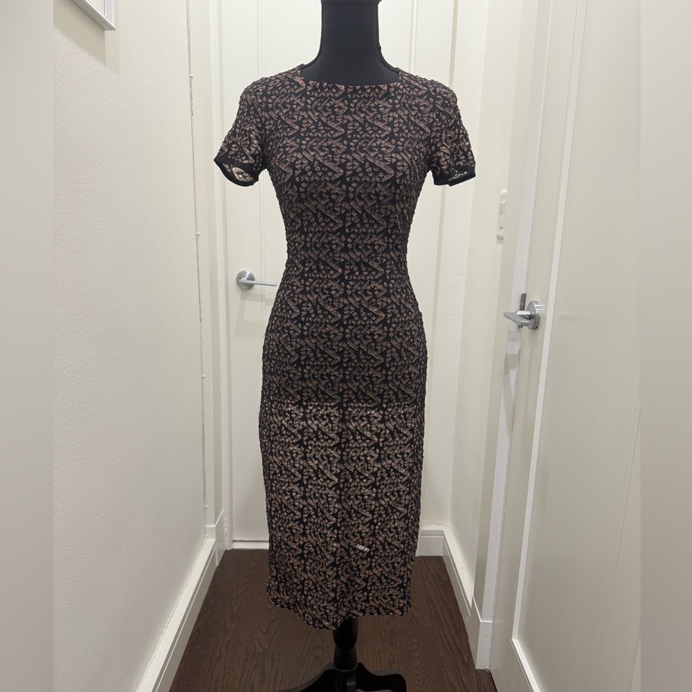 Alaia black and cream viscose blend dress from Spring/Summer 2011 in size 38.